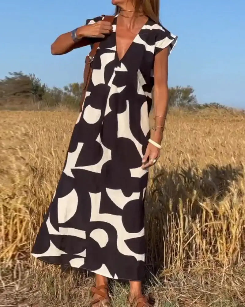 Maura Milano™️ Minimalistyczna sukienka z dekoltem V