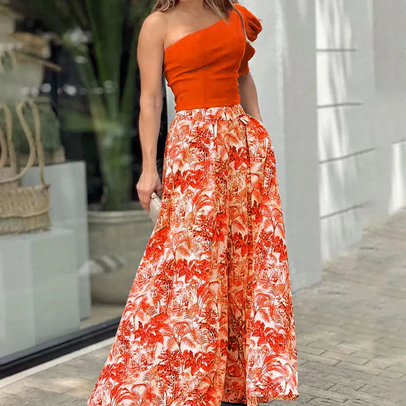 Melissa™ Kombinezon z bufiastym rękawem na jedno ramię, spodnie w kwiaty