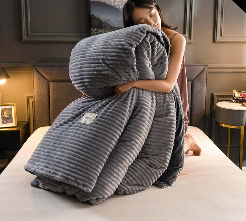 SnuggleLux™ Ciepły koc