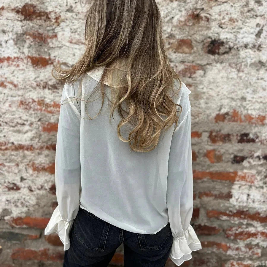 Ottilia Renzo™ Elegancka bluzka z falbanką